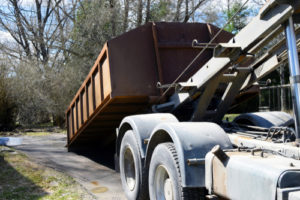 Roll-off dumpster on truck