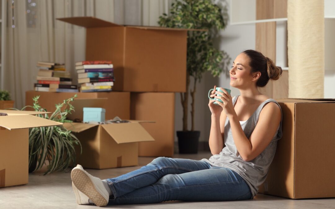woman preparing moving boxes