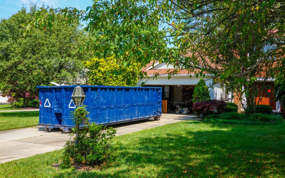 roll off dumpster in front of house in spring