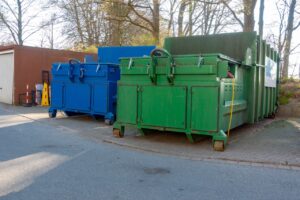 Roll off dumpsters next to each other