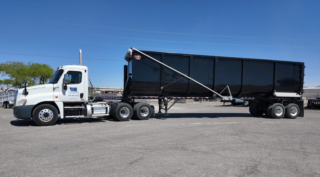 Western Elite tractor with a high side open-top trailer